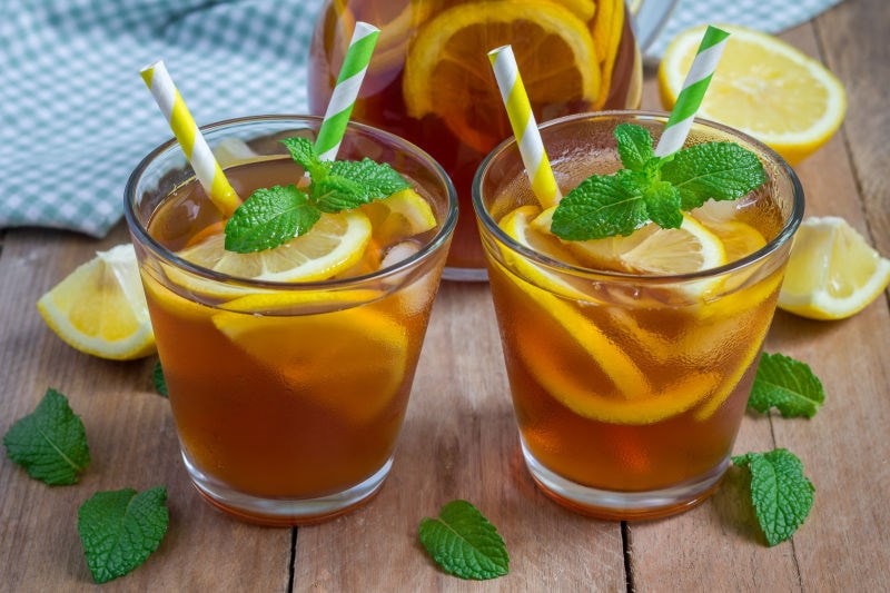 Iced lemon tea with straws