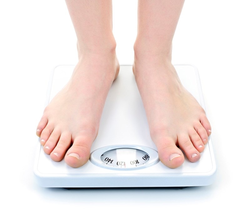 Person on weighing scales