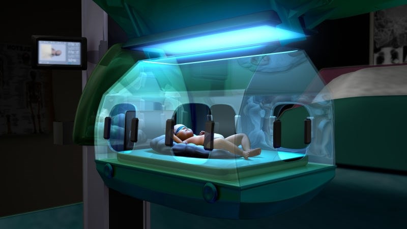baby in an incubator with light treatment 